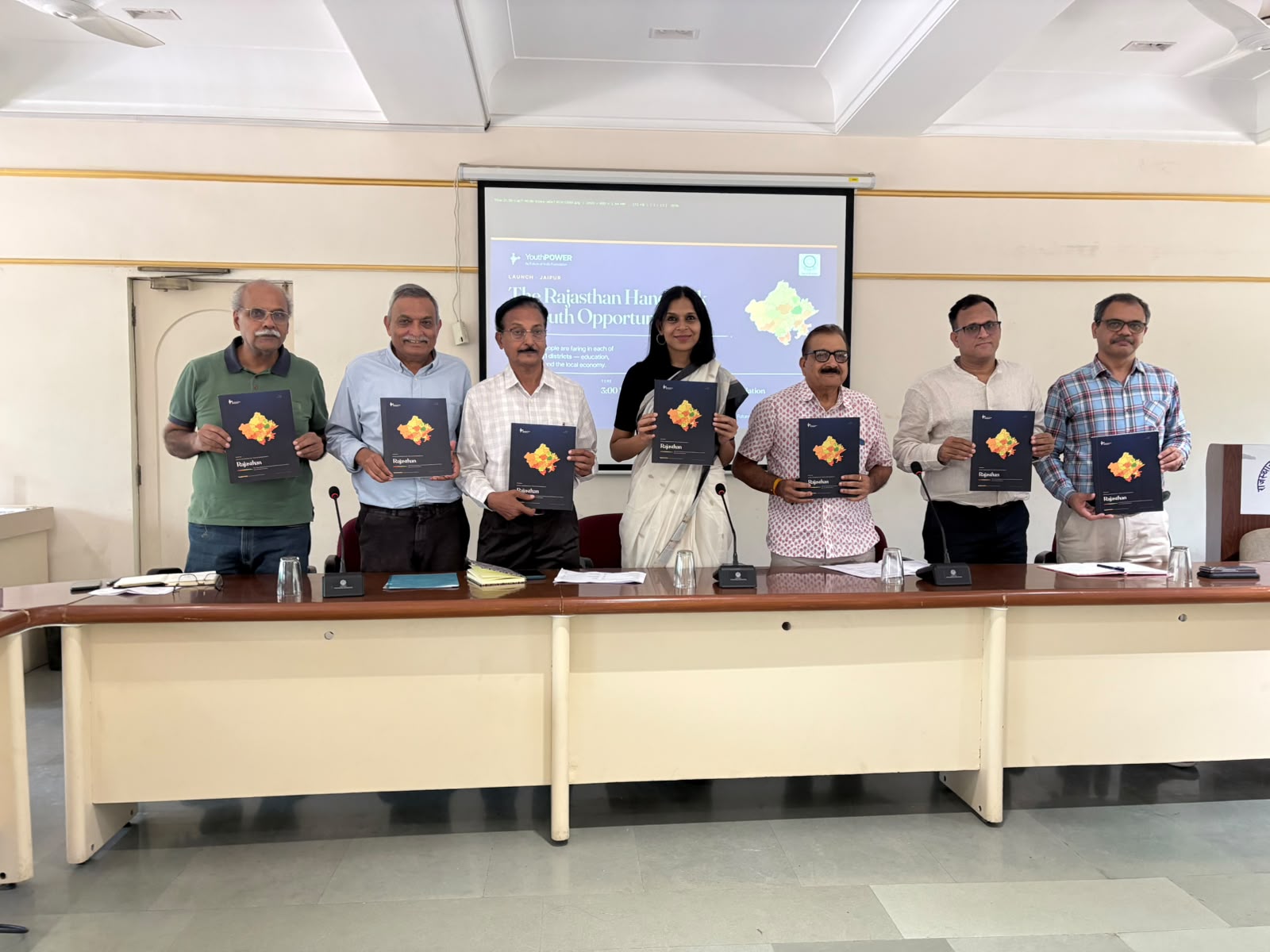 Launched in Jaipur on 8 September 2026 with Seva Mandir. On the panel: Ms. Ruchi Gupta, Executive Director, Future of India Foundation; Prof. Janat Shah, Founding Director, IIM Udaipur; Mr. Ronak Shah, CEO, Seva Mandir; Mr. Hriday Kant Dewan, Setu Initiatives; Mr. Shrinivas Rao, National Lead, Azad Foundation; Mr. Krishnavtar Sharma, Co-founder and Chief Mentor, Aajeevika Bureau; and Mr. Sunny Sebastian, former Vice Chancellor, Haridev Joshi University of Journalism and Mass Communication.